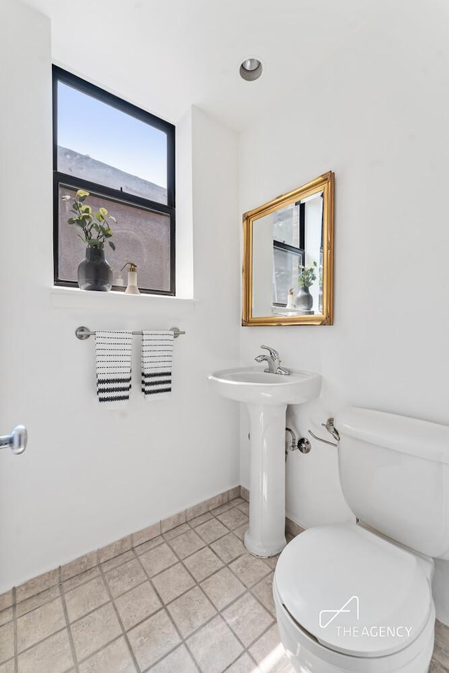 422 State St Unit 6, New York City, NY 11217 - bathroom featuring toilet and baseboards