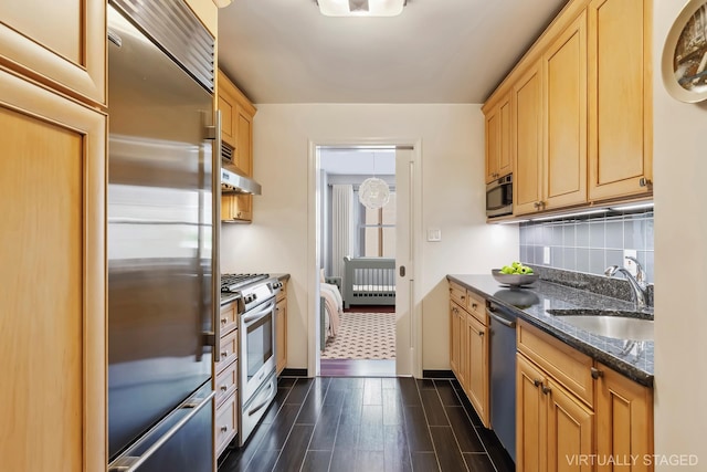 251 E 32nd St Unit 8H, New York City, NY 10016 - kitchen with stainless steel appliances, dark stone counters, tasteful backsplash, and light brown cabinets