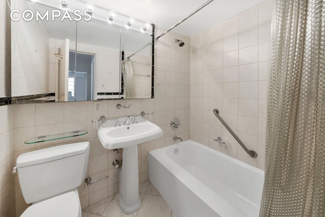 50 Sutton Pl S Unit 5E, New York City, NY 10022 - bathroom featuring shower / tub combo and tile walls
