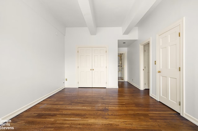 380 W 12th St Unit 6B, New York City, NY 10014 - unfurnished bedroom with dark wood finished floors and beamed ceiling