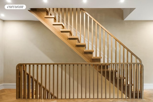 966 Bergen St, New York City, NY 11216 - staircase featuring baseboards and recessed lighting