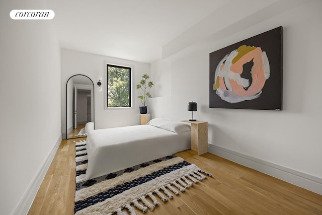 966 Bergen St, New York City, NY 11216 - bedroom featuring wood finished floors and baseboards