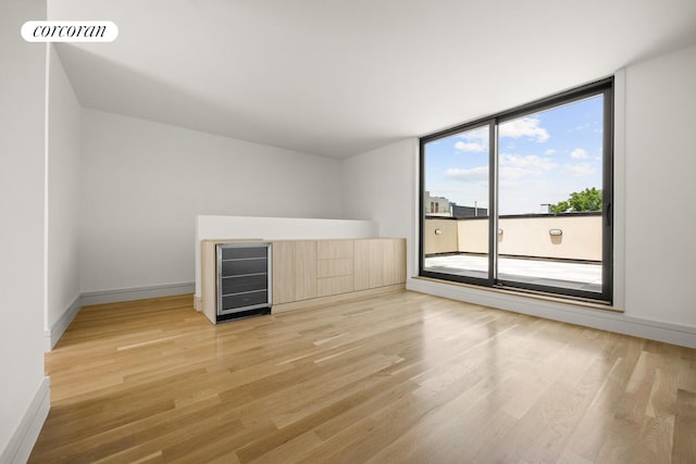 966 Bergen St, New York City, NY 11216 - empty room featuring light wood finished floors