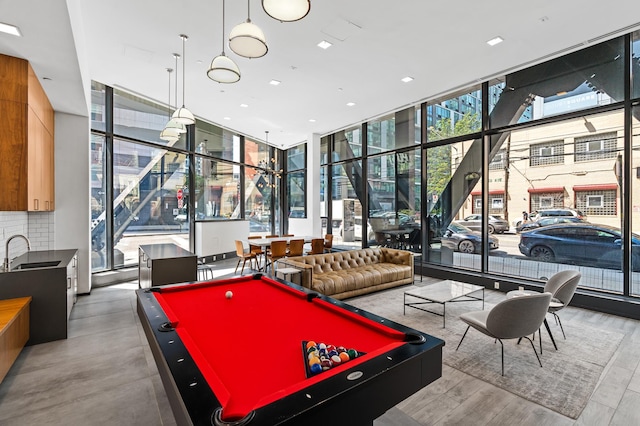 25-21 43rd Ave Unit 511, New York City, NY 11101 - playroom with a wall of windows and pool table