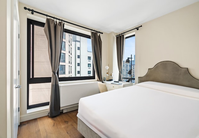 25-21 43rd Ave Unit 511, New York City, NY 11101 - bedroom featuring wood finished floors