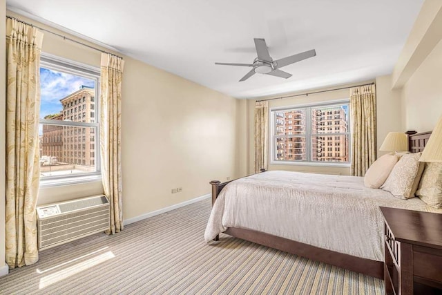 40 E 9th St Unit 9K, New York City, NY 10003 - carpeted bedroom featuring baseboards and ceiling fan