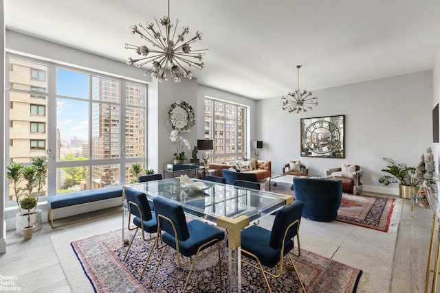200 E 95th St Unit 8C, New York City, NY 10128 - dining room featuring a chandelier and wood finished floors