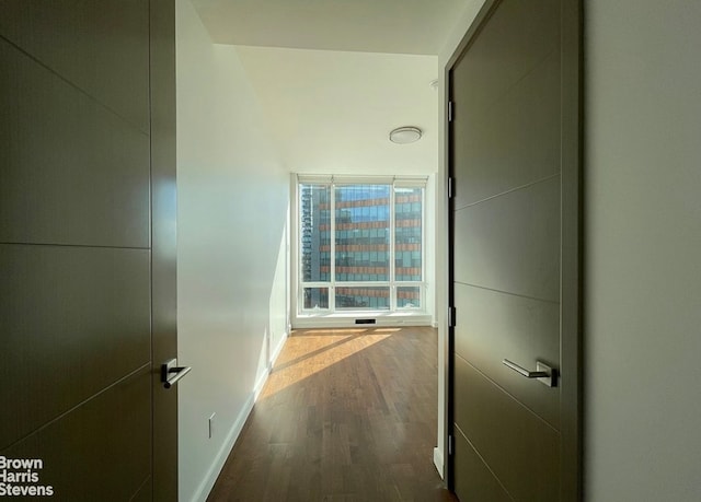 27-17 42nd Rd Unit 14G, New York City, NY 11101 - hall with dark wood-style floors and baseboards
