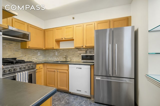 101 W 117th St Unit 5E, New York City, NY 10026 - kitchen with stainless steel appliances, dark countertops, and decorative backsplash