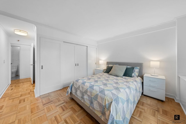 301 E 69th St Unit 12-L, New York City, NY 10021 - bedroom featuring ornamental molding and a closet