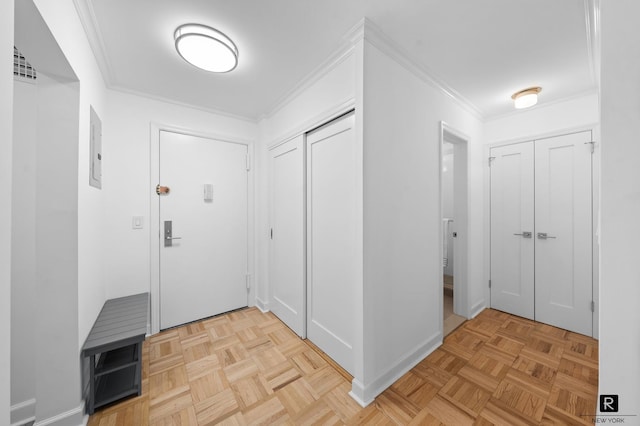 301 E 69th St Unit 12-L, New York City, NY 10021 - entryway featuring crown molding and electric panel