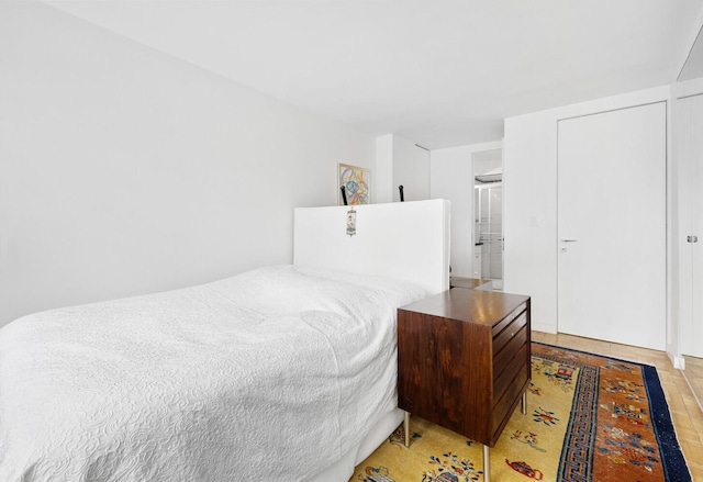 239 E 79th St Unit 9A, New York City, NY 10075 - bedroom featuring light wood-style floors