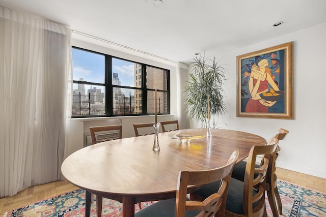 239 E 79th St Unit 9A, New York City, NY 10075 - dining room with a view of city