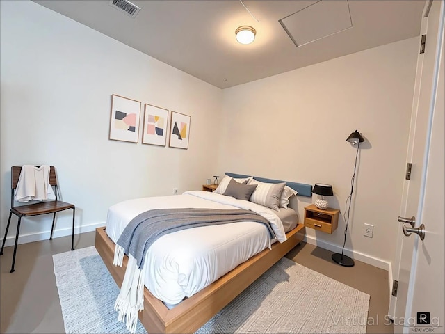 211 E 13th St Unit 6-D, New York City, NY 10003 - bedroom featuring attic access and baseboards