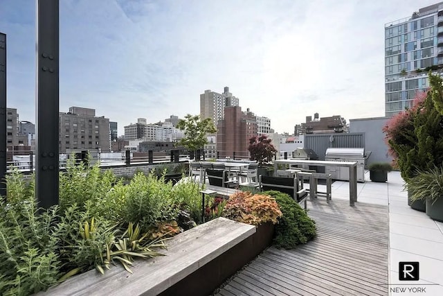 211 E 13th St Unit 6-D, New York City, NY 10003 - deck with a city view and grilling area