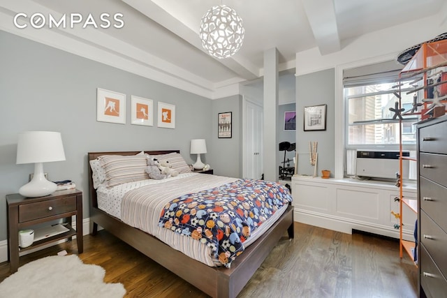 7 E 85th St Unit 5Ab, New York City, NY 10028 - bedroom featuring wood finished floors and beamed ceiling