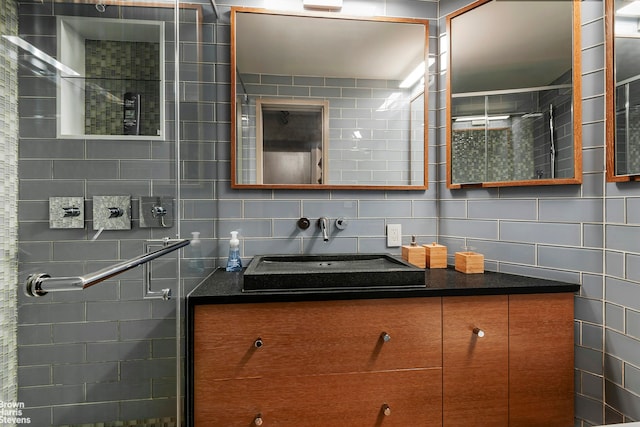 430 W 34th St Unit Lh, New York City, NY 10001 - bathroom with vanity and tile walls