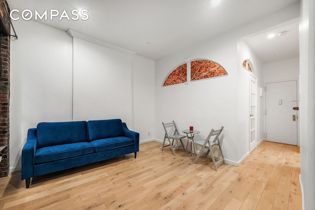 786 9th Ave Unit 2R, New York City, NY 10019 - living area with wood-type flooring and recessed lighting
