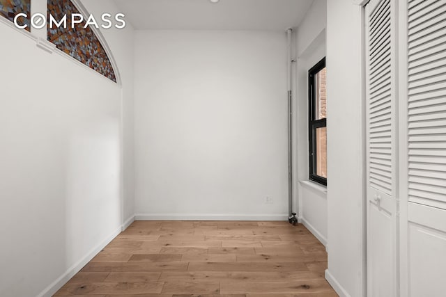 786 9th Ave Unit 2R, New York City, NY 10019 - hallway featuring light wood-style floors and baseboards