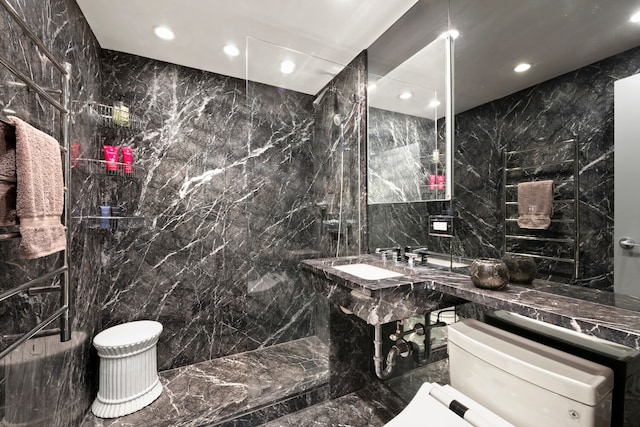 120 E 81st St Unit 12A, New York City, NY 10028 - full bathroom with tile walls, marble tiled flooring, a marble finish shower, and recessed lighting