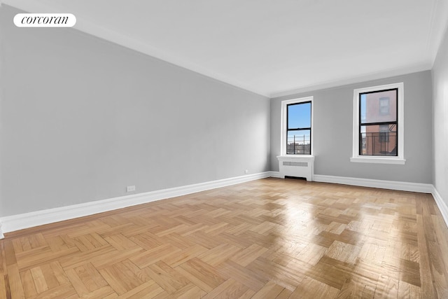 3000 Valentine Ave Unit 3C, New York City, NY 10458 - spare room featuring radiator and ornamental molding