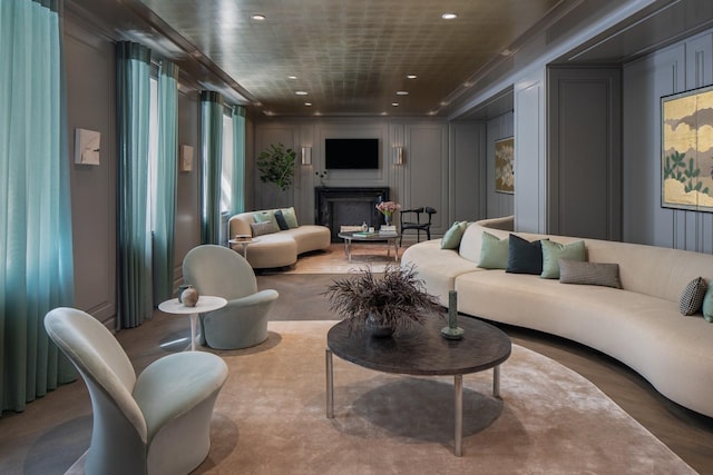 225 W 86th St Unit 407, New York City, NY 10024 - living area featuring a decorative wall, recessed lighting, and a fireplace