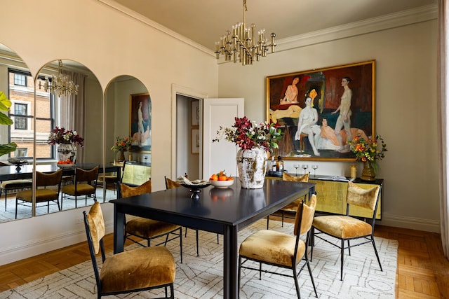 993 Park Ave Unit 11A, New York City, NY 10028 - dining space featuring a chandelier, ornamental molding, and arched walkways