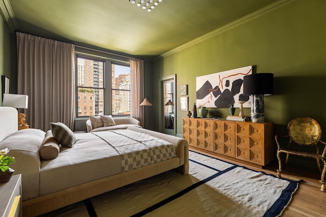 993 Park Ave Unit 11A, New York City, NY 10028 - bedroom featuring wood finished floors and crown molding