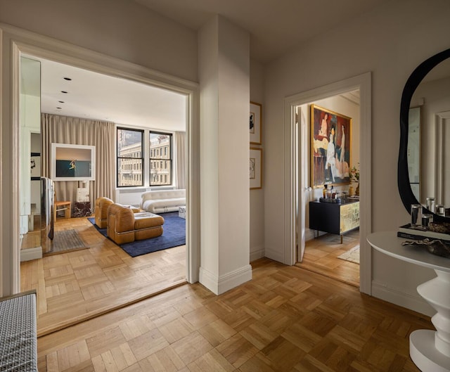 993 Park Ave Unit 11A, New York City, NY 10028 - corridor with arched walkways and baseboards