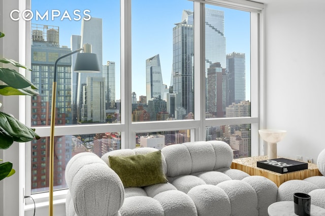 350 W 42nd St Unit 27K, New York City, NY 10036 - sunroom featuring a skyline view and healthy amount of natural light