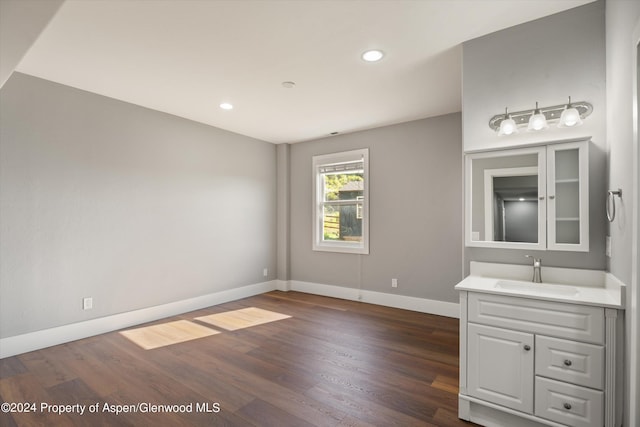 313 Cerise Ranch Rd, Carbondale, CO 81623 - bathroom featuring wood finished floors, baseboards, recessed lighting, and vanity