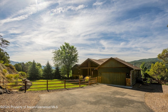 313 Cerise Ranch Rd, Carbondale, CO 81623 - view of front of house with asphalt driveway and a garage