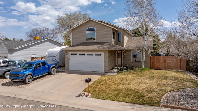 traditional home with a front yard, a garage, fence, driveway, and roof with shingles