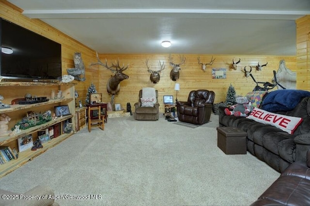 14651 County Road 3, Craig, CO 81625 - living room featuring carpet floors, wood walls, and beamed ceiling
