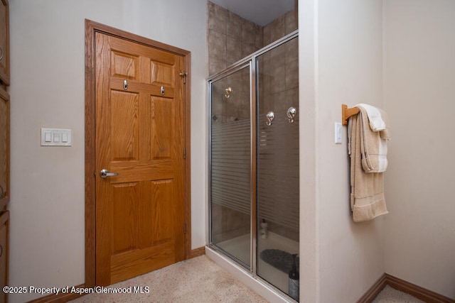 14651 County Road 3, Craig, CO 81625 - bathroom with a shower stall and baseboards
