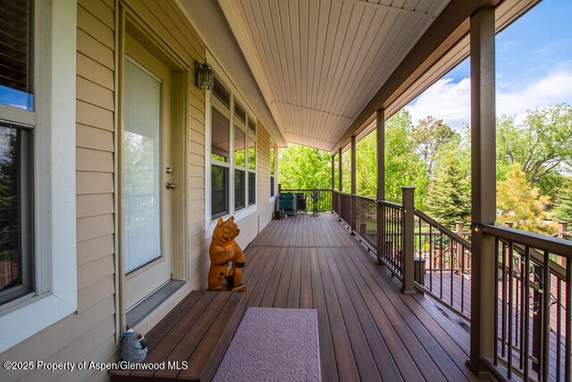 14651 County Road 3, Craig, CO 81625 - wooden deck featuring covered porch