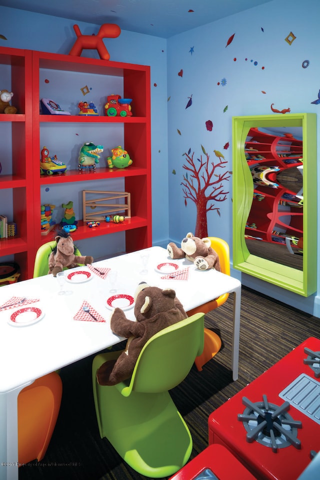 view of carpeted dining space