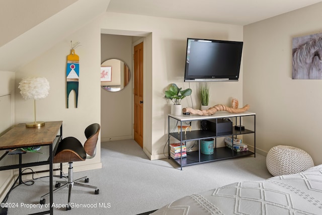 home office featuring carpet flooring and lofted ceiling