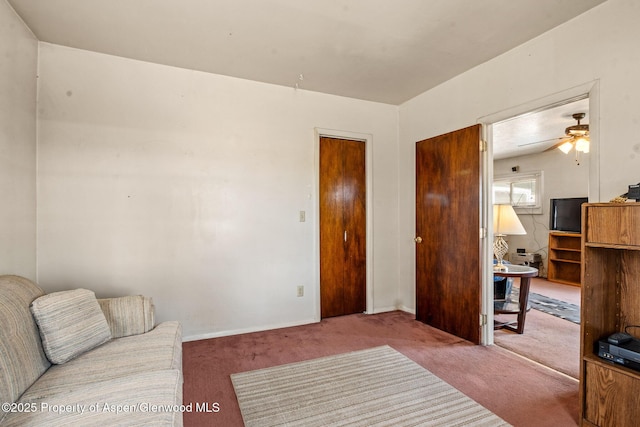 812 Home Ave, Silt, CO 81652 - carpeted living room with a ceiling fan and baseboards
