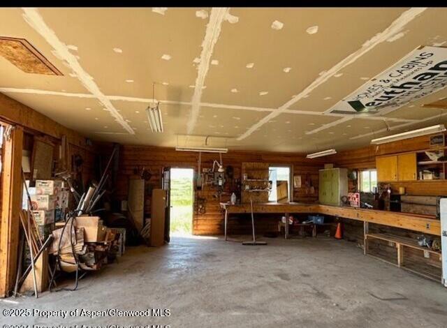 garage featuring a workshop area