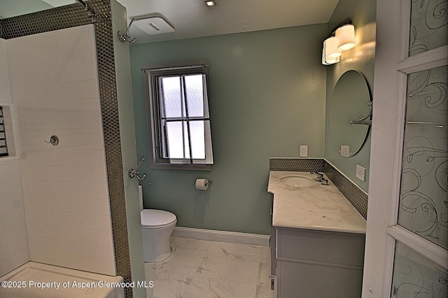 572 E Main St, New Castle, CO 81647 - full bath featuring marble look tile flooring, a tile shower, and vanity