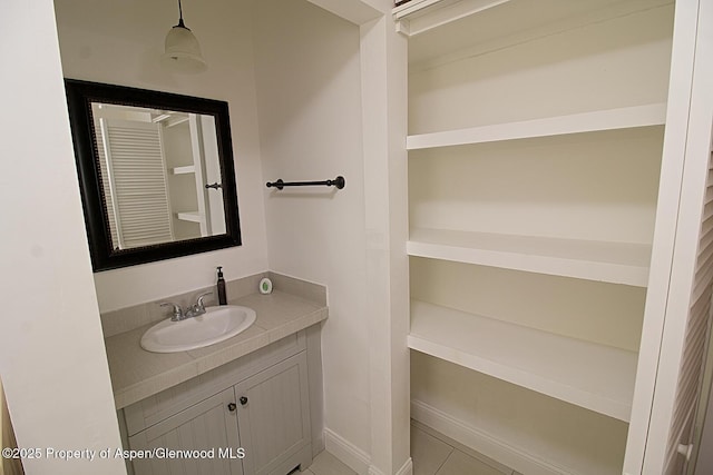 572 E Main St, New Castle, CO 81647 - bathroom with vanity and tile patterned flooring