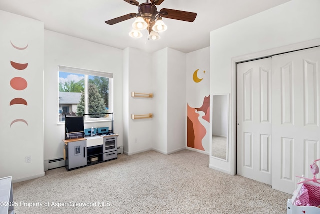 24 Lupine Ln, Parachute, CO 81635 - bedroom featuring light colored carpet, a closet, a ceiling fan, and baseboards