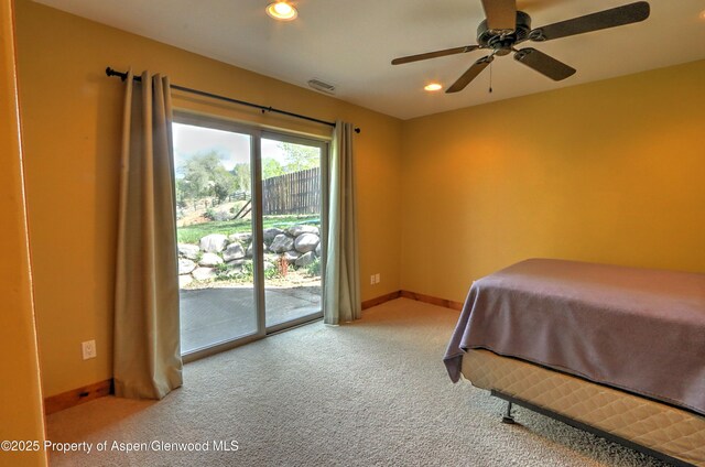 bedroom featuring visible vents, access to exterior, carpet floors, baseboards, and recessed lighting