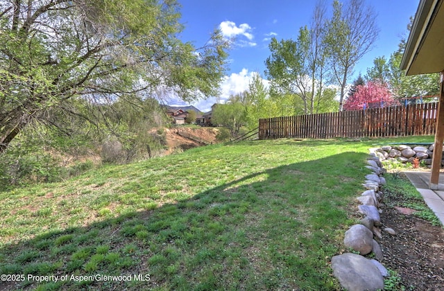 view of yard featuring fence