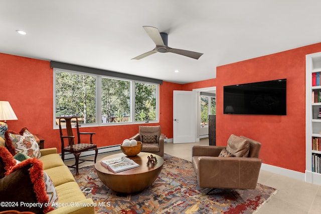 living room with a baseboard radiator and ceiling fan