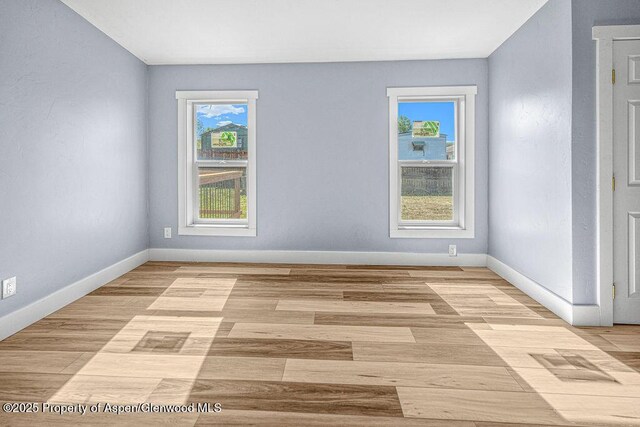 955 Sequoia Ave, Craig, CO 81625 - unfurnished room with baseboards and light wood-style flooring
