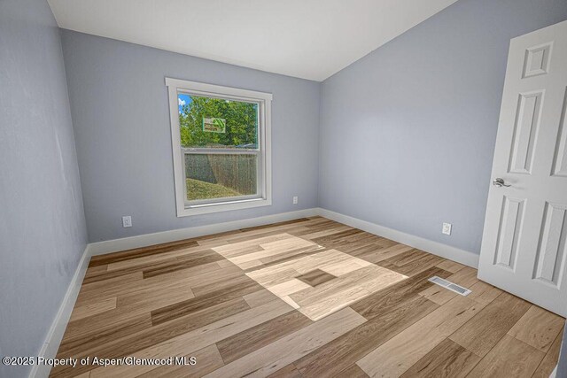 955 Sequoia Ave, Craig, CO 81625 - unfurnished room featuring wood finished floors and baseboards