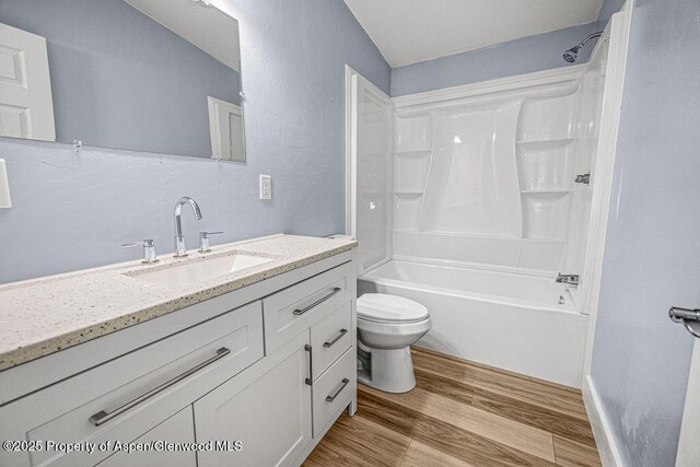 955 Sequoia Ave, Craig, CO 81625 - full bath featuring wood finished floors, vanity, and shower / bathtub combination