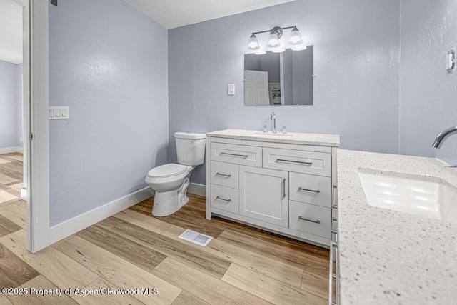 955 Sequoia Ave, Craig, CO 81625 - bathroom with vanity and wood finished floors